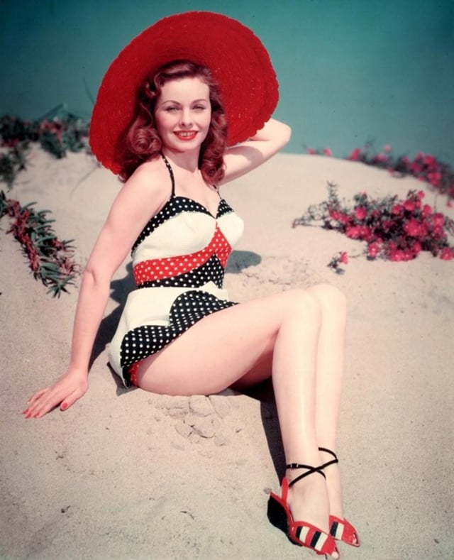 VictoriaAsh1978's tweet photo. A beach day made eternal—Jeanne Crain showing us that true beauty lives in the poise as much as the pose. A goddess of grace, even with sand at her feet. 🌹🏖️ https://t.co/GekXFddnnm