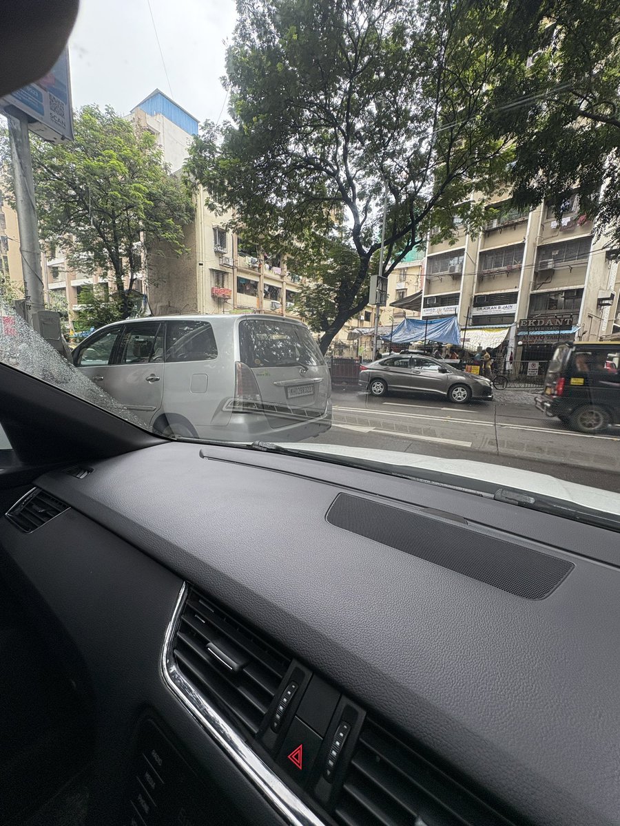 chiragkapadia's tweet photo. Blocking the turn and parked illegally. Require a no parking barricade. This has become a daily issue.  Mh02BR3227. To turn left you have to go onto the other side of the road and is dangerous.

(19.0186506, 72.8340631) no parking board is put up. 
@MTPHereToHelp @MumbaiPolice https://t.co/ijm5jMGZVi