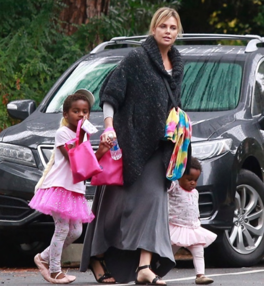 Correction Charlize Theron adopted to Black Boys and made them dress like little girls.