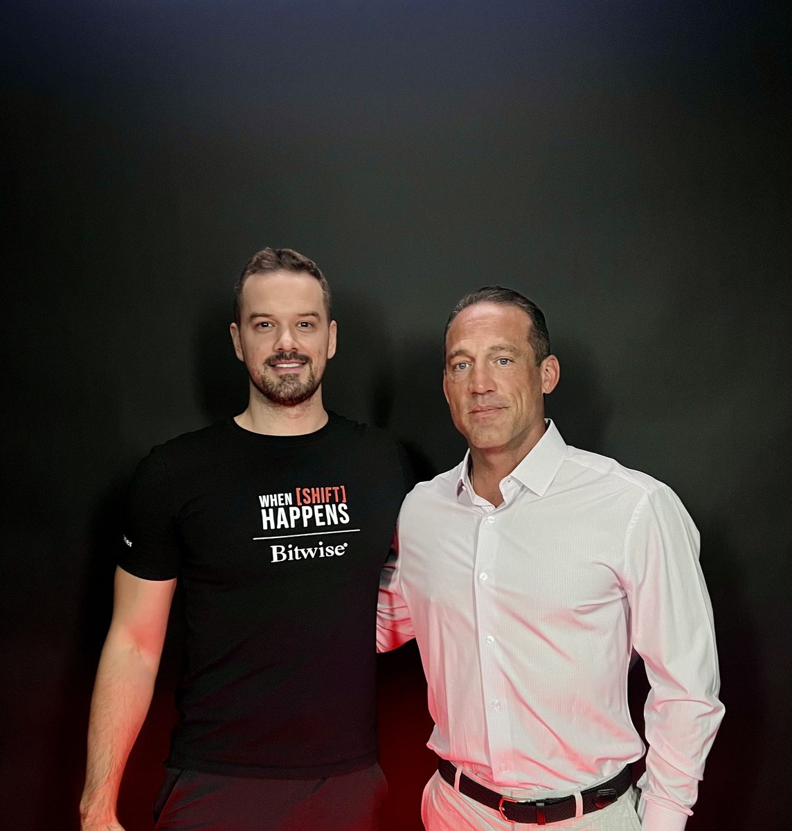 Podcast host Kevin and Bitcoin educator Mark Moss posing in the HK studio