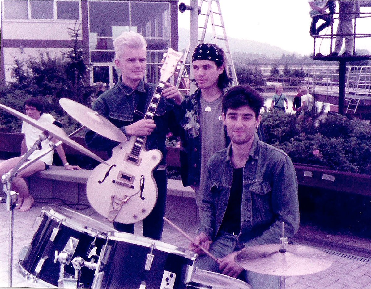Falcon Friday 🤍🦅
Photo taken on a break from recording ‘Go West’ for a German TV show called Music Convoy in 1984. At the time we didn’t have a record deal in Europe and Ian stuck a sign to the back of his guitar saying, ‘SIGN US NOW’.

#TheCult #BillyDuffy #IanAstbury