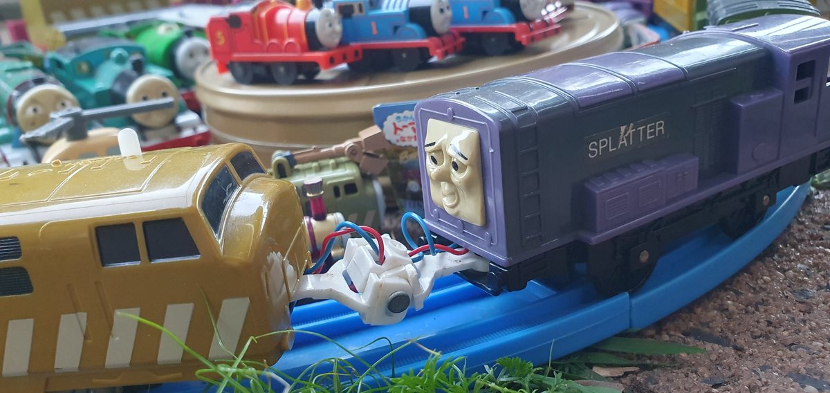 magicrailroad25's tweet photo. A few other images of some of the other pieces of memorabilia you can see above including the very rare unpowered Plarail Splatter and Dodge with front hooks. 

The talking D10's motor is sluggish and there's no claw, but he works!

- Joseph https://t.co/ZRWvBzN9wd