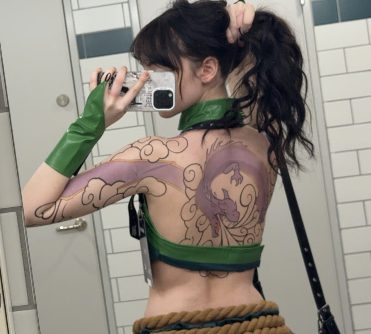Imaging walking into a public bathroom and seeing Akali checking out her tattoos