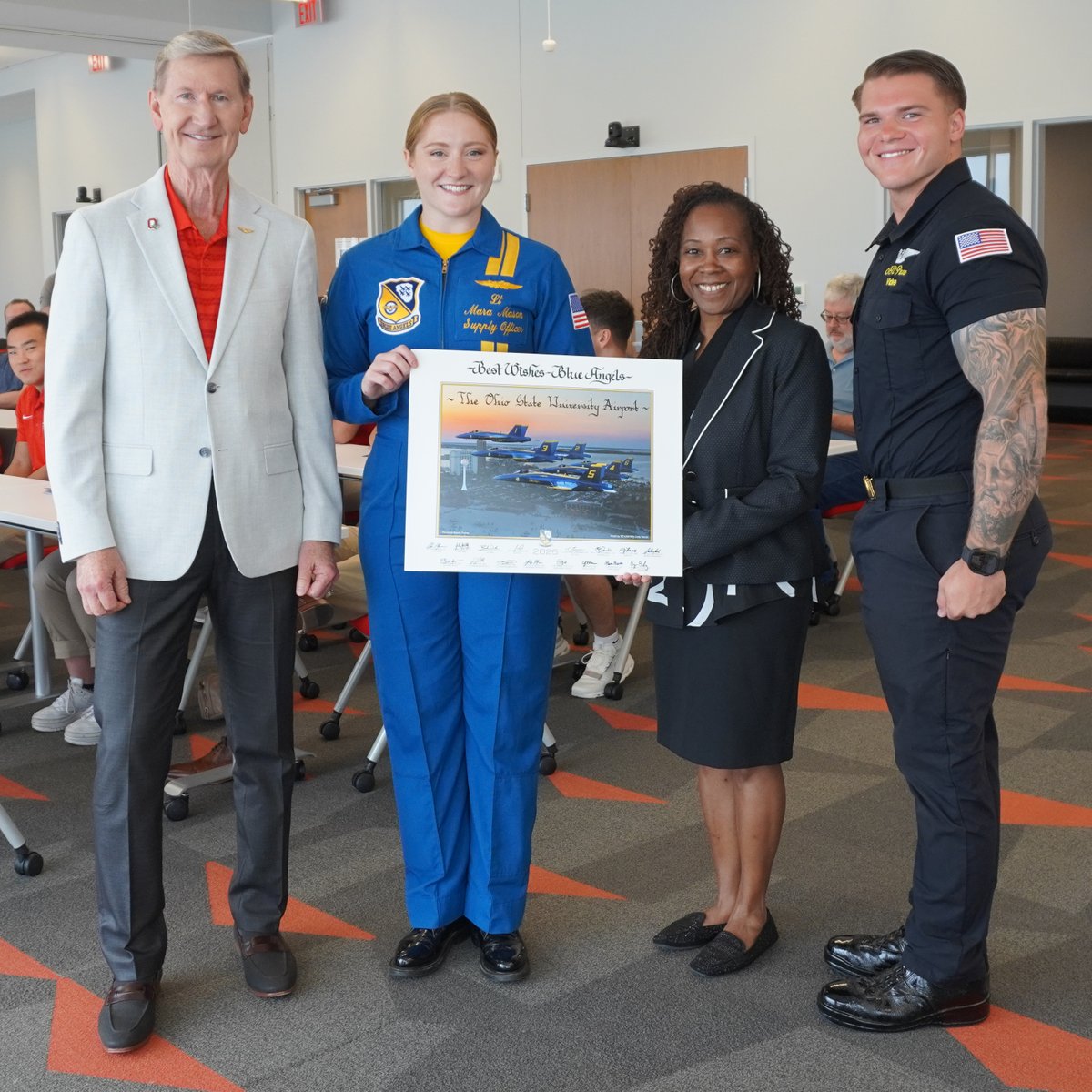 cas_osu's tweet image. We marked Columbus’ #NavyWeek with special guests at @OSU_Airport. @ohiostatepres joined us, along with @osuengineering Dean Ayanna Howard to welcome @BlueAngels #BuckeyeForLife Mara Mason and Chris Parr for an inspiring, career-focused presentation. Thank you! ✈️