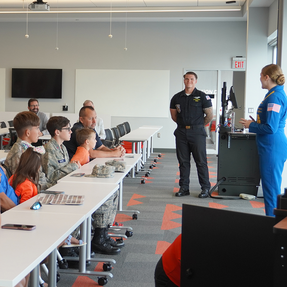 cas_osu's tweet image. We marked Columbus’ #NavyWeek with special guests at @OSU_Airport. @ohiostatepres joined us, along with @osuengineering Dean Ayanna Howard to welcome @BlueAngels #BuckeyeForLife Mara Mason and Chris Parr for an inspiring, career-focused presentation. Thank you! ✈️