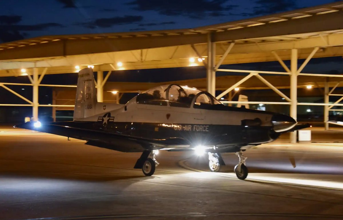 AETCommand's tweet image. Training, developing and educating a ready force takes relentless commitment day and night. From early morning PT at Basic Military Training to night flight ops at our pilot training bases, #AETC never stops.