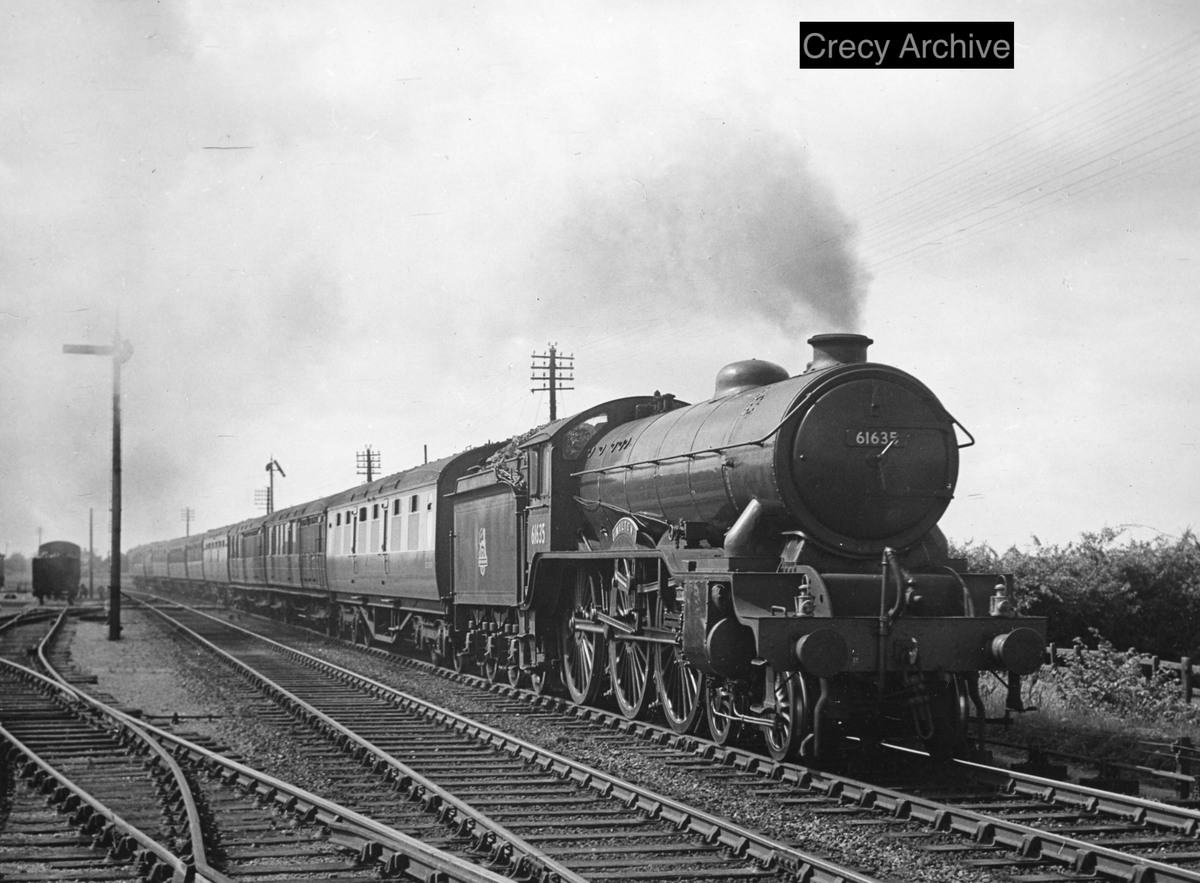 A superb photo of a very well presented B17, No 61635 Milton, passing through Pinchbeck, north of Spalding, with a Harwich to Liverpool service in July 1951. The large 6ft 8in driving wheels of these handsome locos, introduced in 1928, are shown to good effect in the picture.