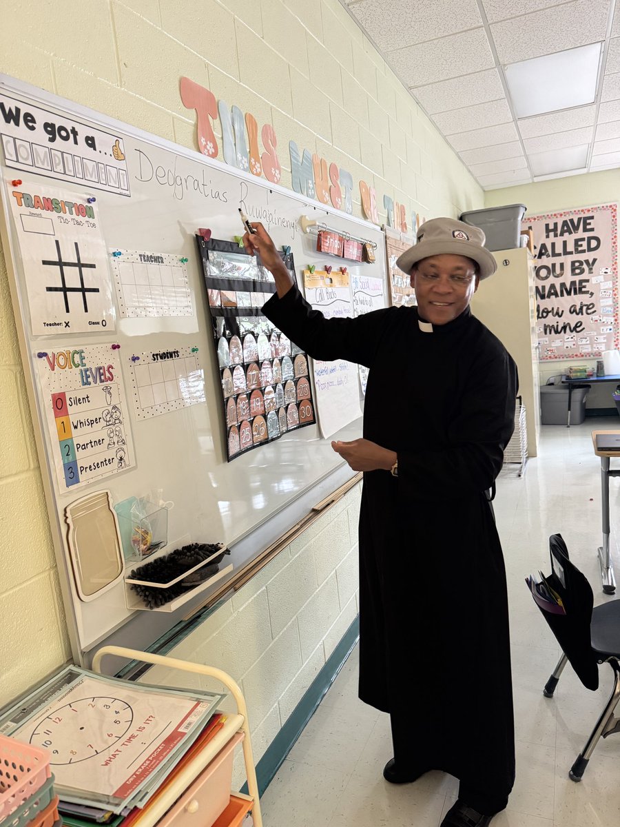 Today we read "The Name Jar" as we get ready to learn about the history behind our names! Fr. Dep stopped by &amp; taught us all about the importance of his own name! ❤️