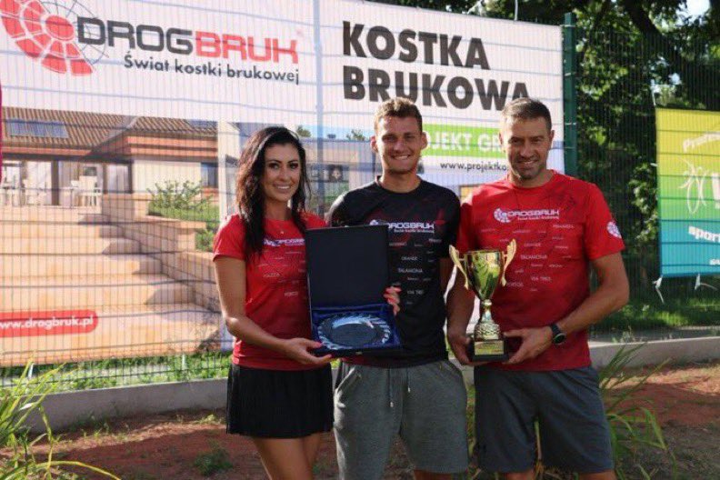 rgfray1's tweet image. His name is Piotr Szczerej.

his company name is Drogbruk, from Poland.
#USOpen