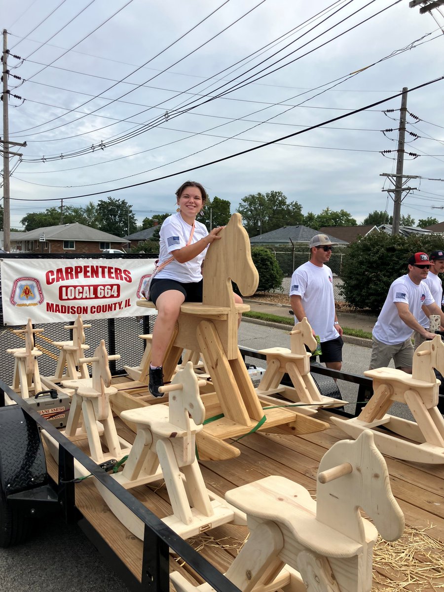 MidAmCarpenters's tweet image. Labor Day parade season has already begun! Members of #Local664 turned out in full force for the Madison County Federation of Labor parade and brought with them handcrafted camp chairs and kids’ rocking horses assembled at our Belleville Training Center that some lucky folks will