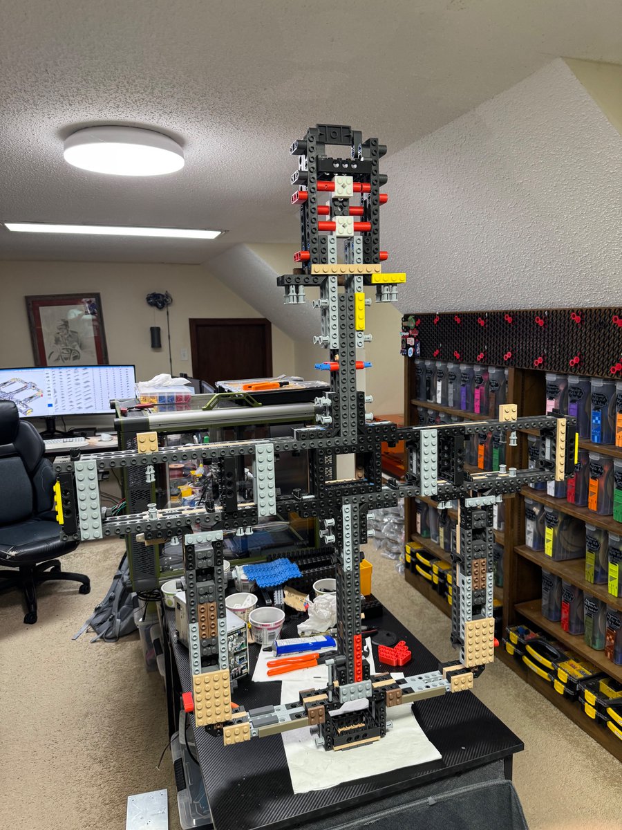 step 103 out of 1379 - I'm still on the first "bag" of the instructions!  Everything looks miniature in the photo but that's a two-foot / 600mm wide table, and a 350-sized Doomcube (chunky Voron 2.4) that's hiding behind it.