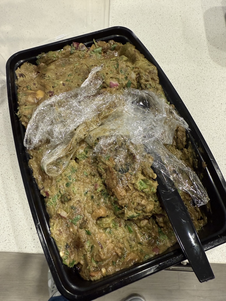 IsraelDLazo's tweet photo. Hey @ChipotleTweets , this you?? We ordered for a catered event and this was the guac we received. Tried contacting the support and the store. No response. https://t.co/8QrqNXVJdD