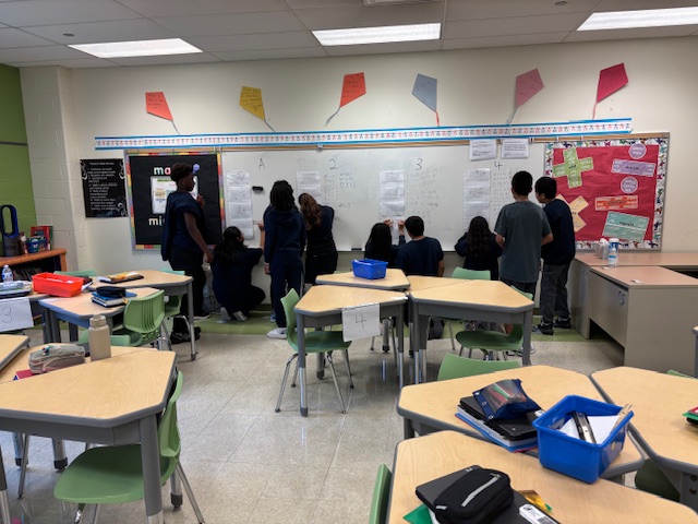 working on vertical spaces to collaborate on answering questions about rigid transformations.