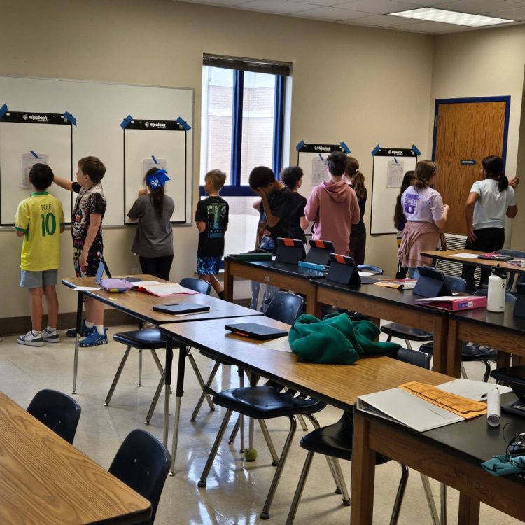 By having students working on "vertical non-permanent surfaces", students are able to see, edit, and collaborate to solve problems. This is from Peter Liljedahl's research "Building Thinking Classrooms". Mrs. Walker is utilizing this with her 6th grade math students!
