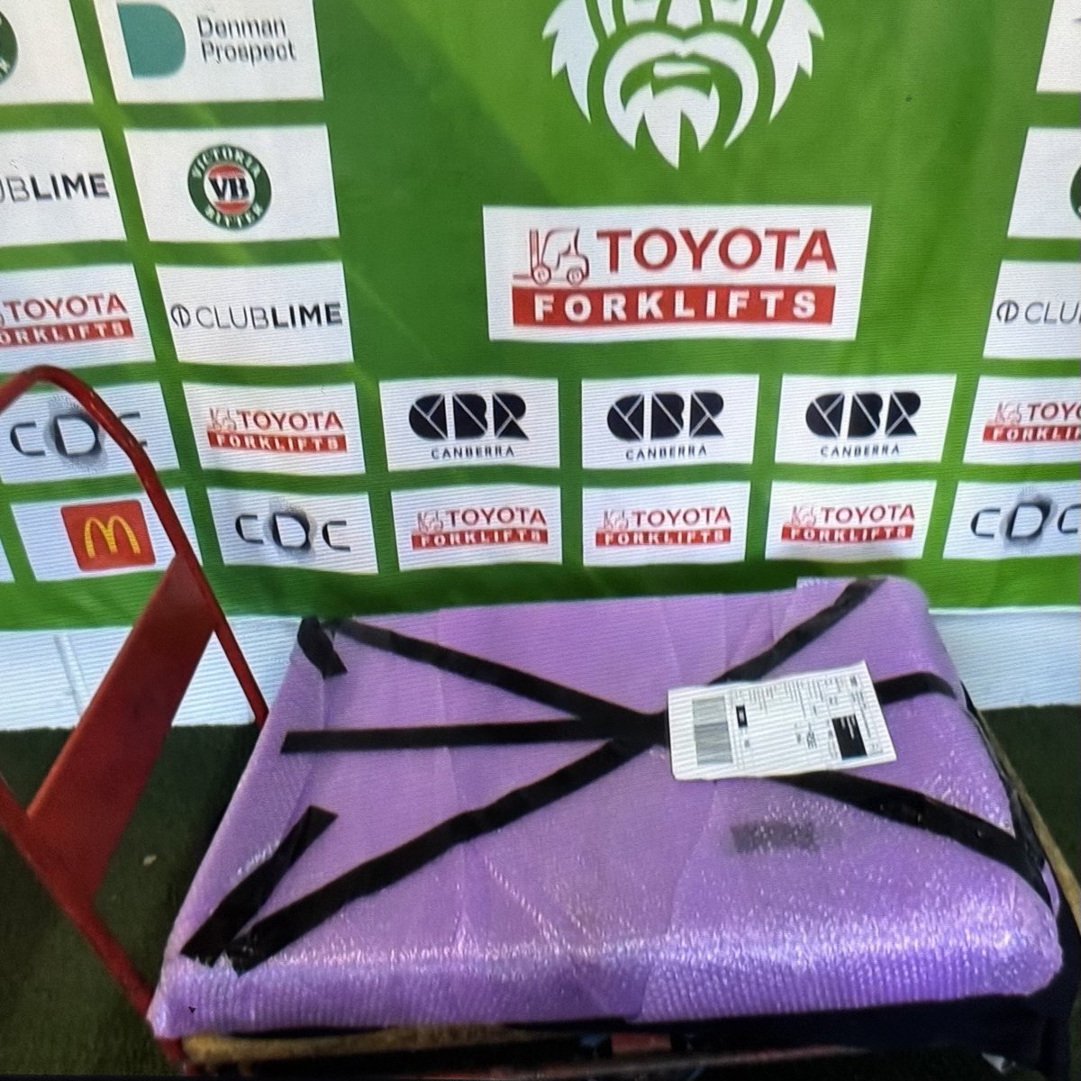 Toyota Forklifts unveils its latest lifter, seen here carrying a mysterious purple package that was enroute to Melbourne apparently.