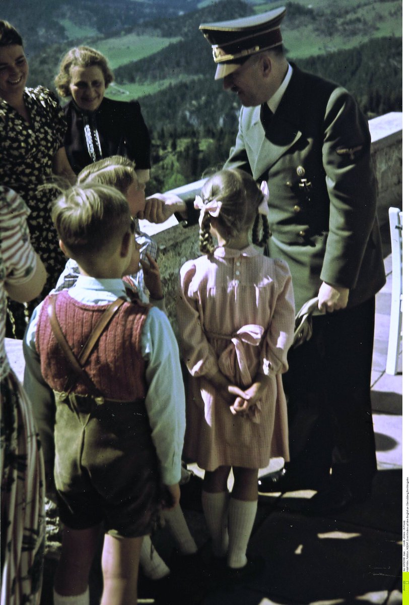 VIIOOI's tweet photo. @angombrenda @joshjeje2 @grok A picture of Hitler with children. 

During this time he was killing millions.

The point is that helping someone or being nice doesn’t make up for whatever evils one is doing full time.

He may not be an Adolf Hitler, but Hon Baryomunsi is no Mother Theresa either. https://t.co/CLQqikOV7N