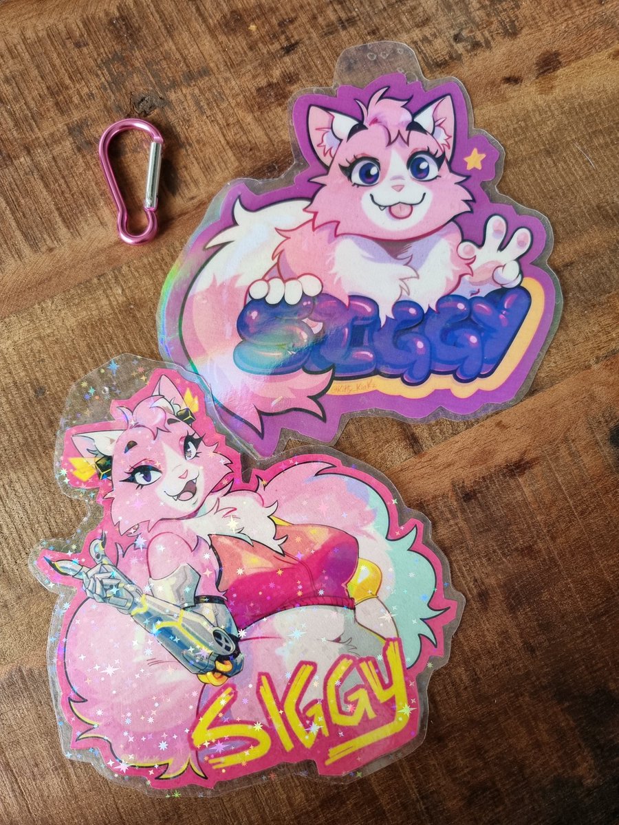 Getting my badges ready for #Eurofurence29! I am super excited to fursuit for the first time! :3

Art by <a href="/Kitty_Kinkz/">KiriKatt 🔞🍑</a> 🩷💜💛

#fursuit #furry #eurofurence