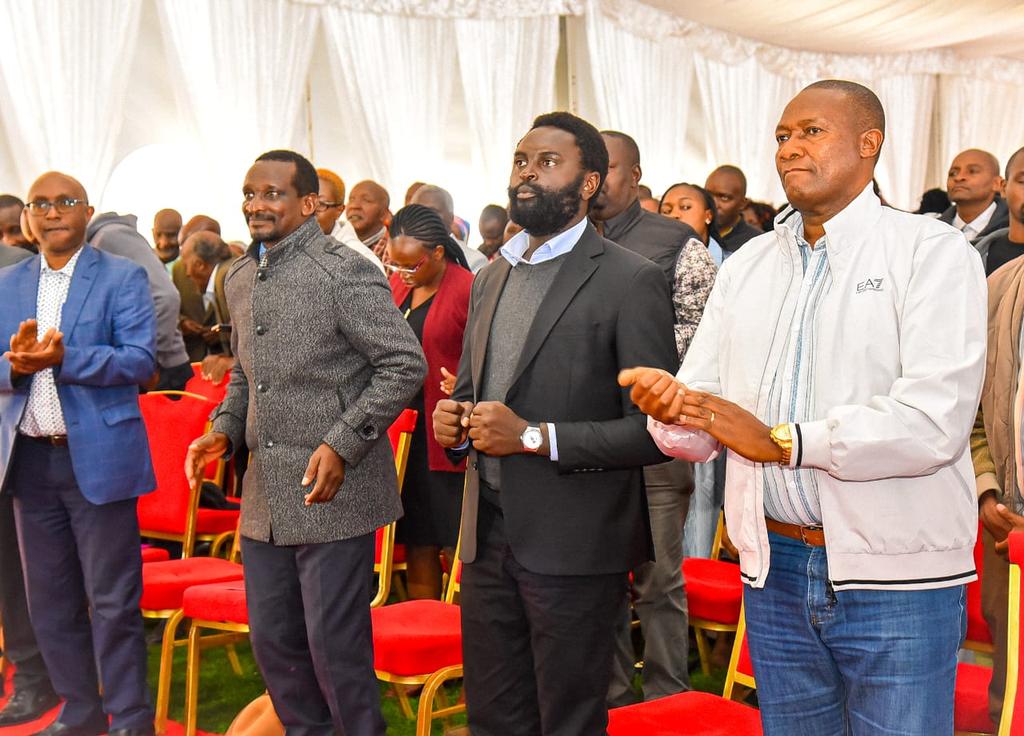 David Mathu Comforting the family of QS David Mathu, MD NHC, at the celebration of ...