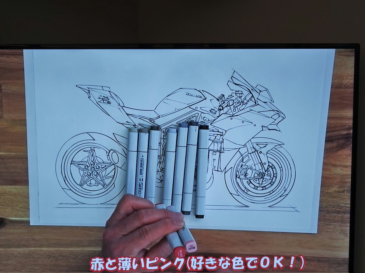 カワサキのフクモトさんの描き方は、環境光を排除した白ホリスタジオみたいな光源で、強いハイライトをタンクにギラっと入れる。それを太いコピックでギュンギュン力強く塗っていく…という感じなんだそうです。そういうのをヤマハのイームラさんの解説付で鑑賞できました。ゼータクな体験でしたよー。
