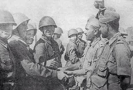 After separate British &amp; Soviet invasions of Iran from north &amp; east, allied Red Army &amp; British Indian troops meet each other:
