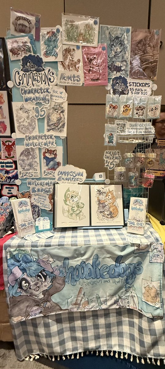 hoodiedogs_'s tweet image. at long last i am all set up at the megaplex artist alley!!! its been a rough couple of days between the reg line and all of the con's delays with setup this morning so please come through and say hi if you're here 🥺💞