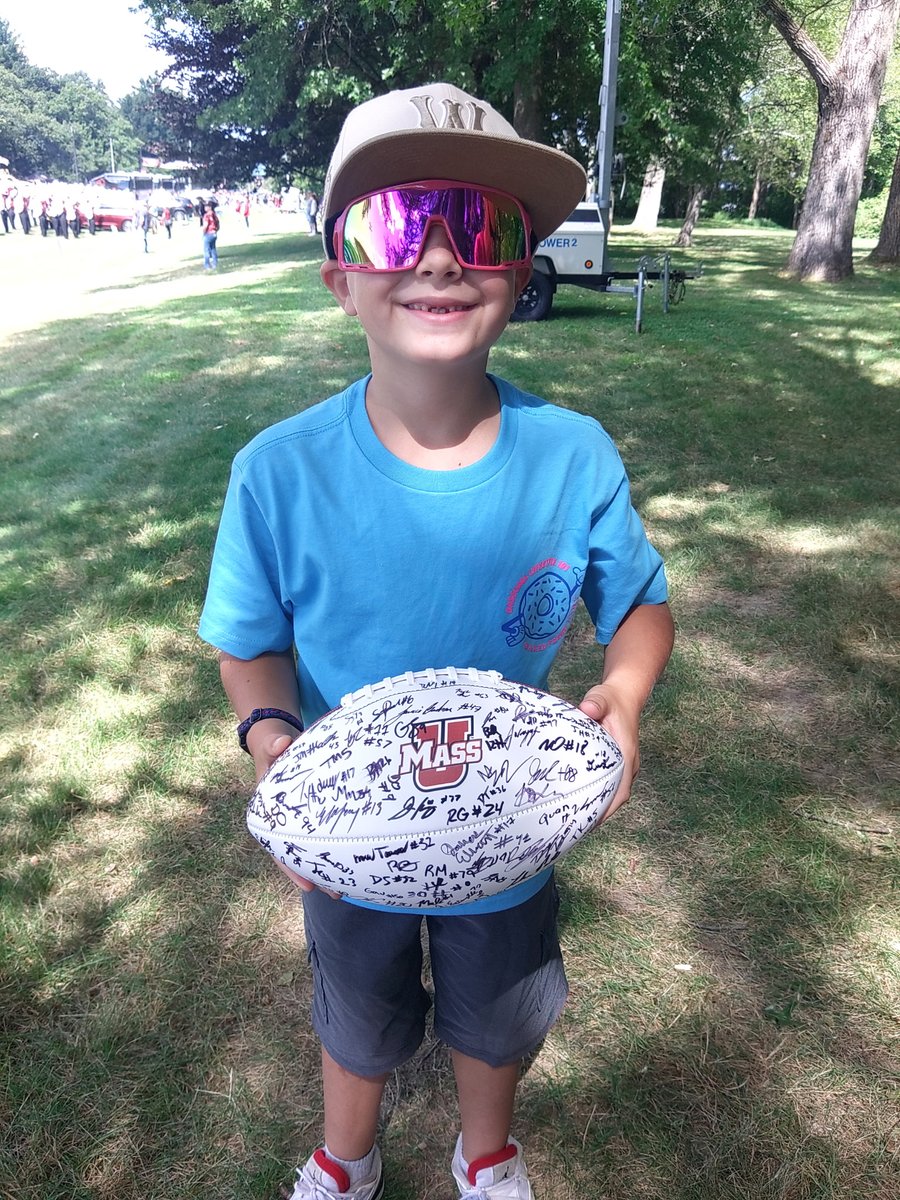 Holy SHIT!!! My friend's son was handed this ball as <a href="/UMassFootball/">UMass Football</a> made their march to the stadium!!! #Flagship🚩He is ECSTATIC. Let's Go UMass!!!