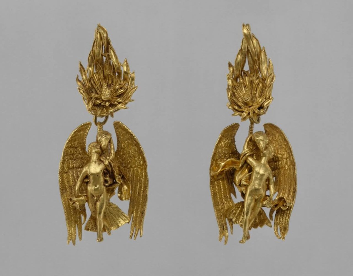 Greek pair of gold earrings depicting Ganymede and the eagle, c. 330–300 BC.