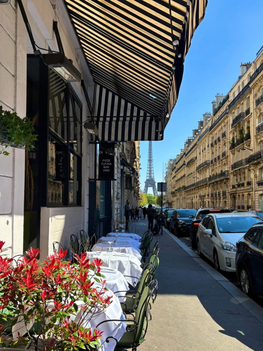 Alice198906158's tweet image. “Parisian street magic—café tables lined up, vibrant red foliage, and the Eiffel Tower peeking in the distance. Doesn’t get more iconic than this! 🇫🇷🗼
#ParisVibes #EiffelTowerViews”