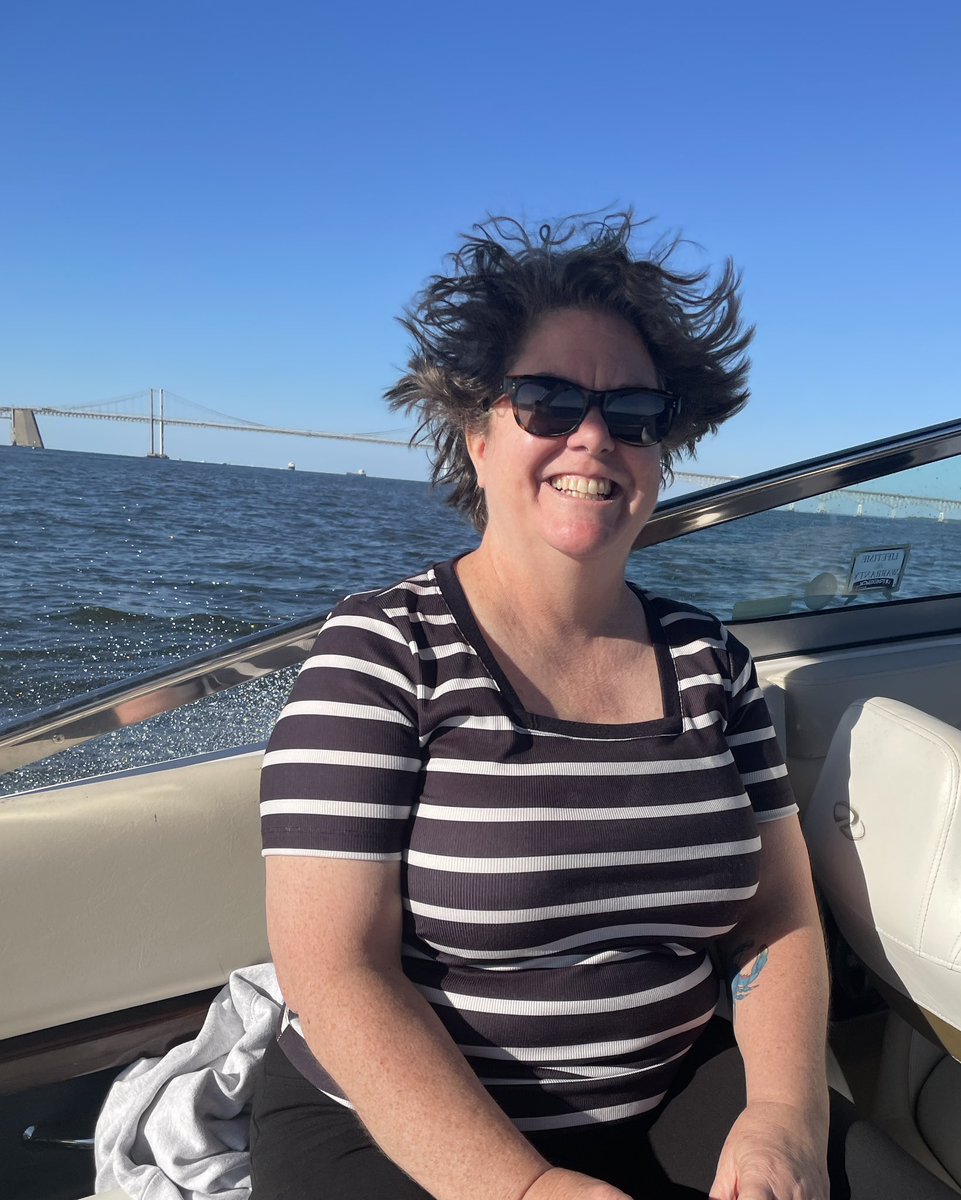 Crazy hair, Bay Bridge, family time, big grin!