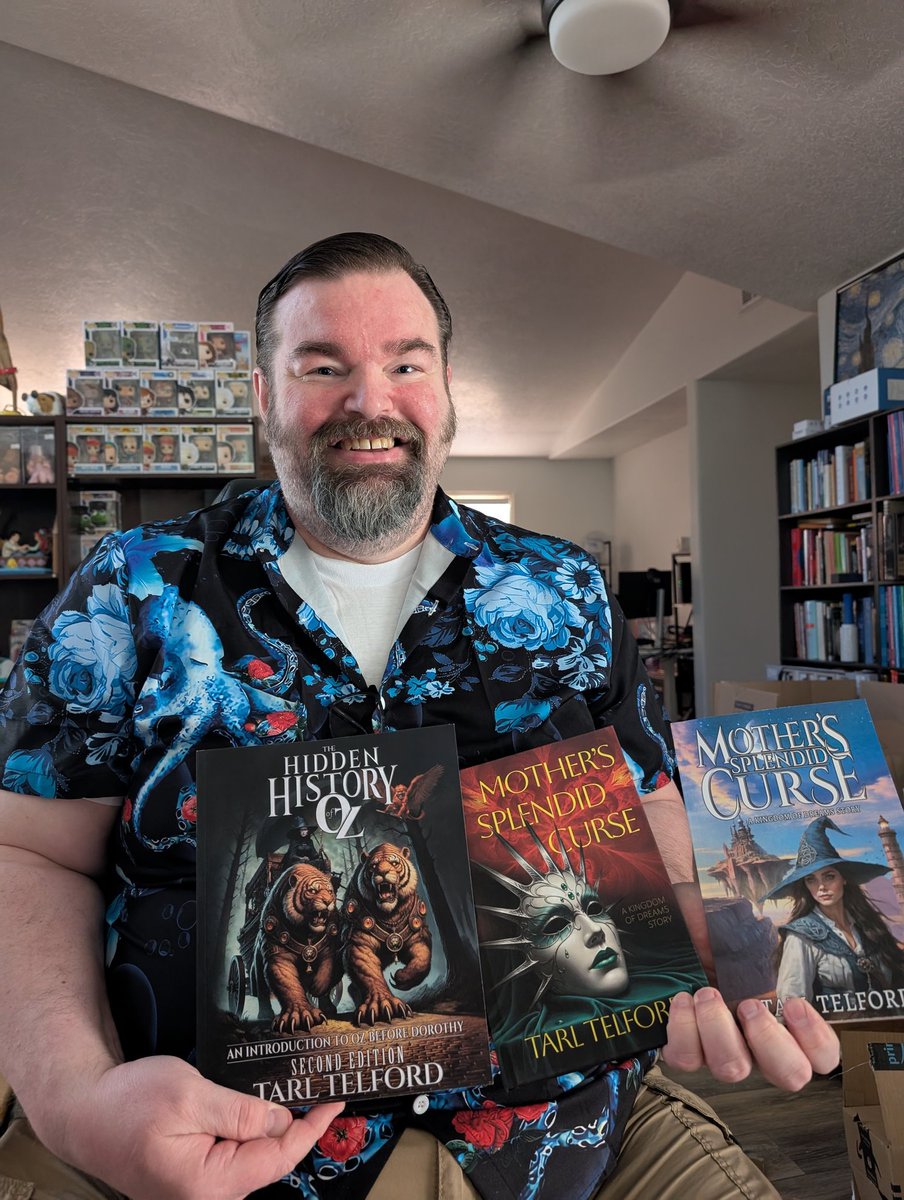 singingal's tweet photo. @HiddenHistoryOz my husband @tarlcreates I ordered some of his books.. 📚 Such a fun series . Here's a handsome picture of how happy to see his copies in hand of just few of his books 😁 Grab your copies on Amazon 

#epicfantasy #hiddenhistoryofoz #authors #writers #authorhusband https://t.co/Mykjgdt8vp