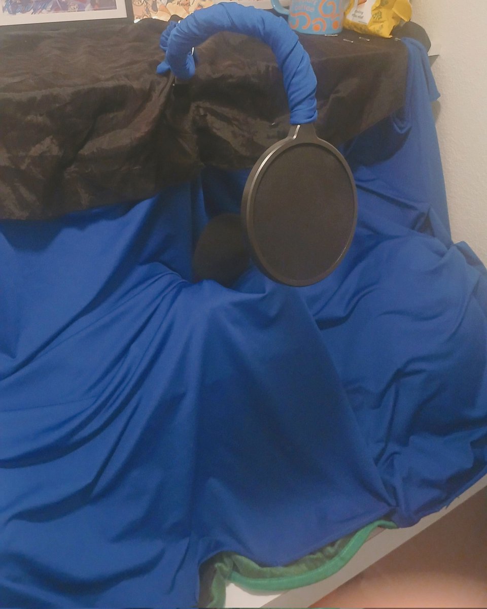 Your recording space is important, even if its a bunch of plushies, blankets, and fabric. It's better than yapping into a bare wall.

This is my "new" set up. More organized, fabric specifically placed, and some extra fabric to wrap around the pop filter 💙