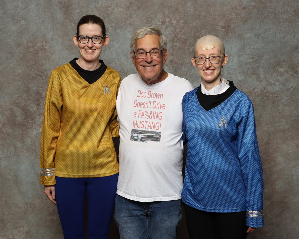 lisagoudy's tweet photo. “Whoa, this is heavy.” It was so cool for @sheldon_spock1 & I to meet #BobGale, co-writer of the #BackToTheFuture franchise & musical, @FANEXPOCANADA on Sunday!! He was friendly & really liked our cosplay!! #fanexpocanada2025 #backtothefuturetrilogy #backtothefuturethemusical https://t.co/dmhA7Bow4G