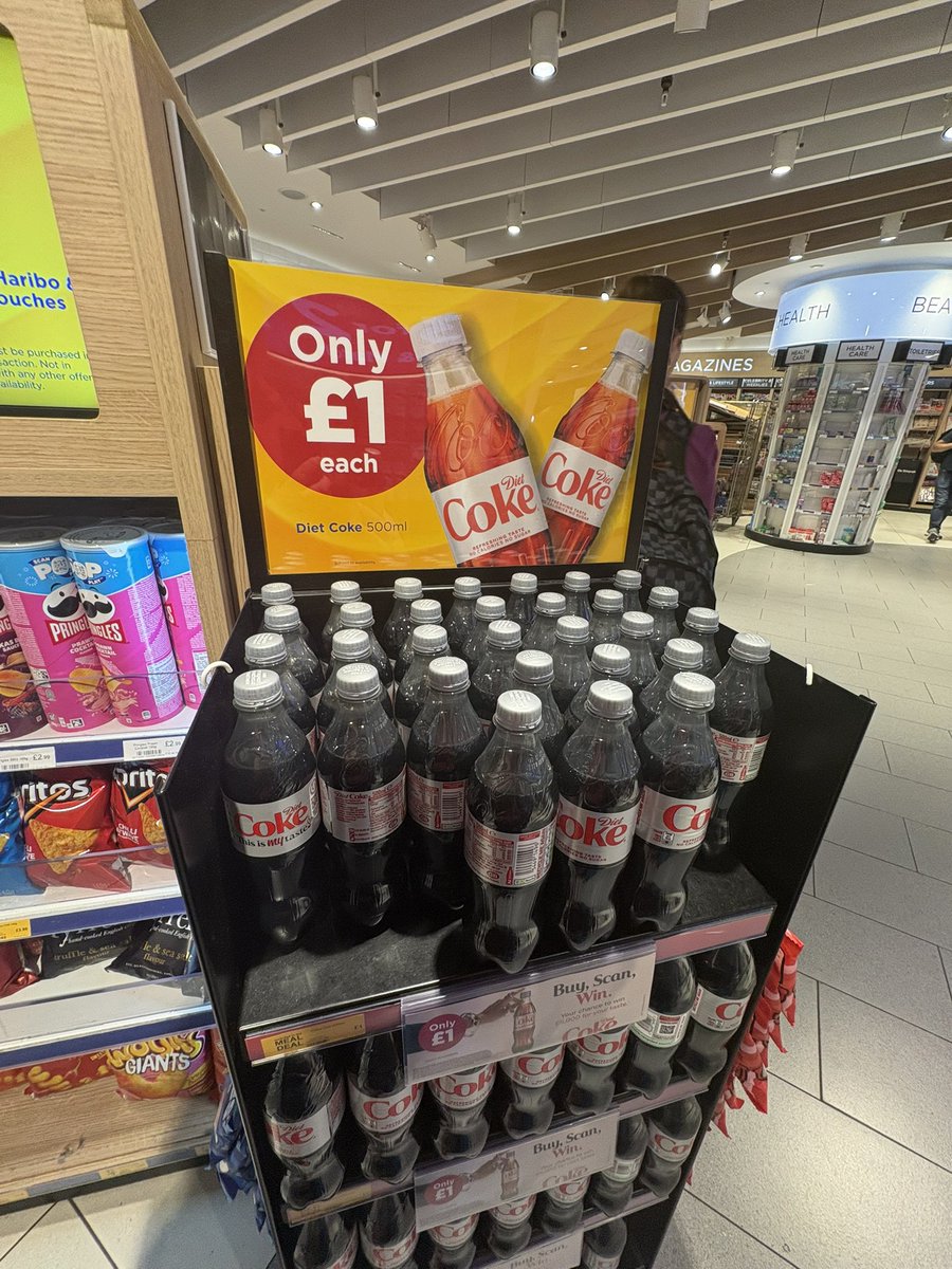 zachariahassler's tweet image. Best bargain at Gatwick airport WhSmith is these £1 Diet Cokes picks up 2 of them #themeparks #whsmith #gatwickairport
