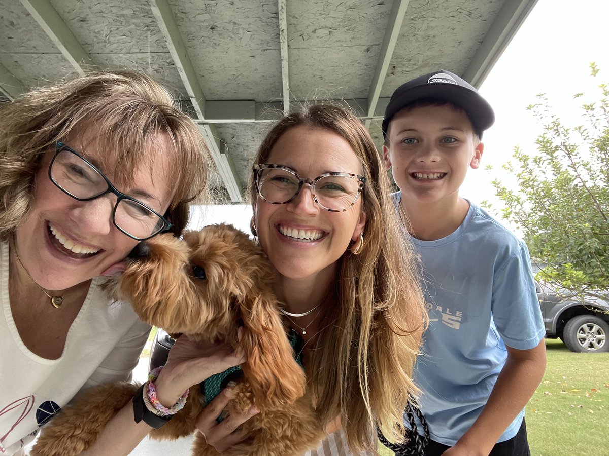 Marshal 103.5FM Morning in the Fort Show host Karen Pharis gets a lick from Banks for Labor Day Weekend party as Gretchen and Liam Pharis enjoy the fun.