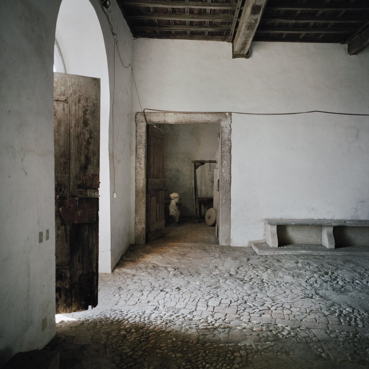 The smell of damp air and stone.