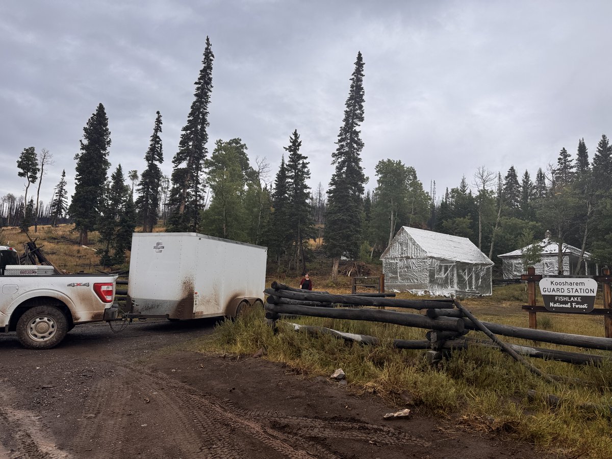 #MonroeCanyonFire crews wrapped the historic Koosharem guard station in aluminized fire-resistant material to help protect the buildings from wildfire Protective wrap helps shield structures from extreme heat and flames preventing damage or destruction during intense fire events