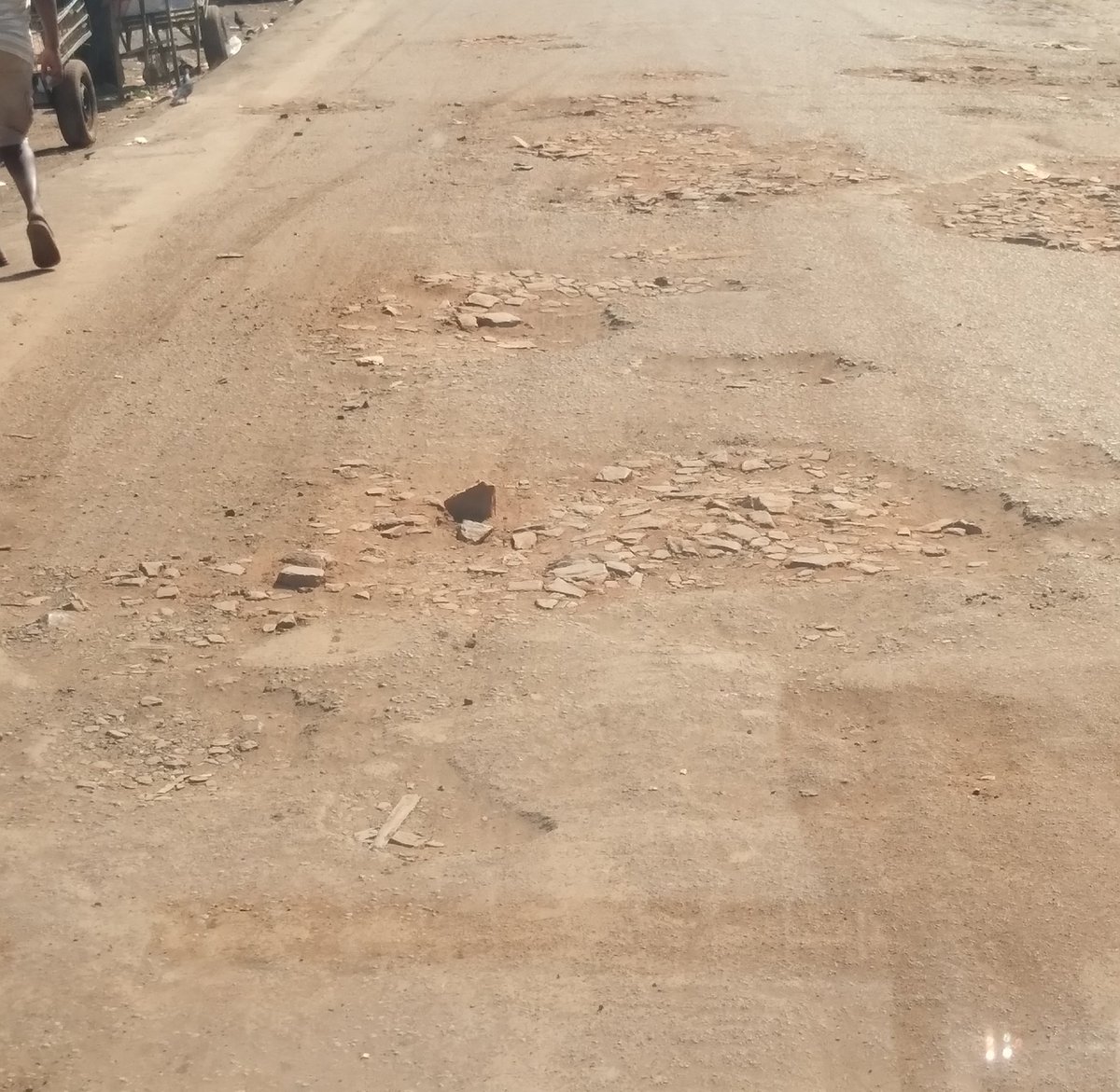 SoniaMarrion's tweet photo. #Tabho Migwagwa yekuKuwadzana iyi, thin strips and patches of tar clinging to life, surrounded by dust and potholes. Sometimes we can't tell if there ever was tar.
#ZANUMustGo #EDMiswa https://t.co/OoSbDHlvzD