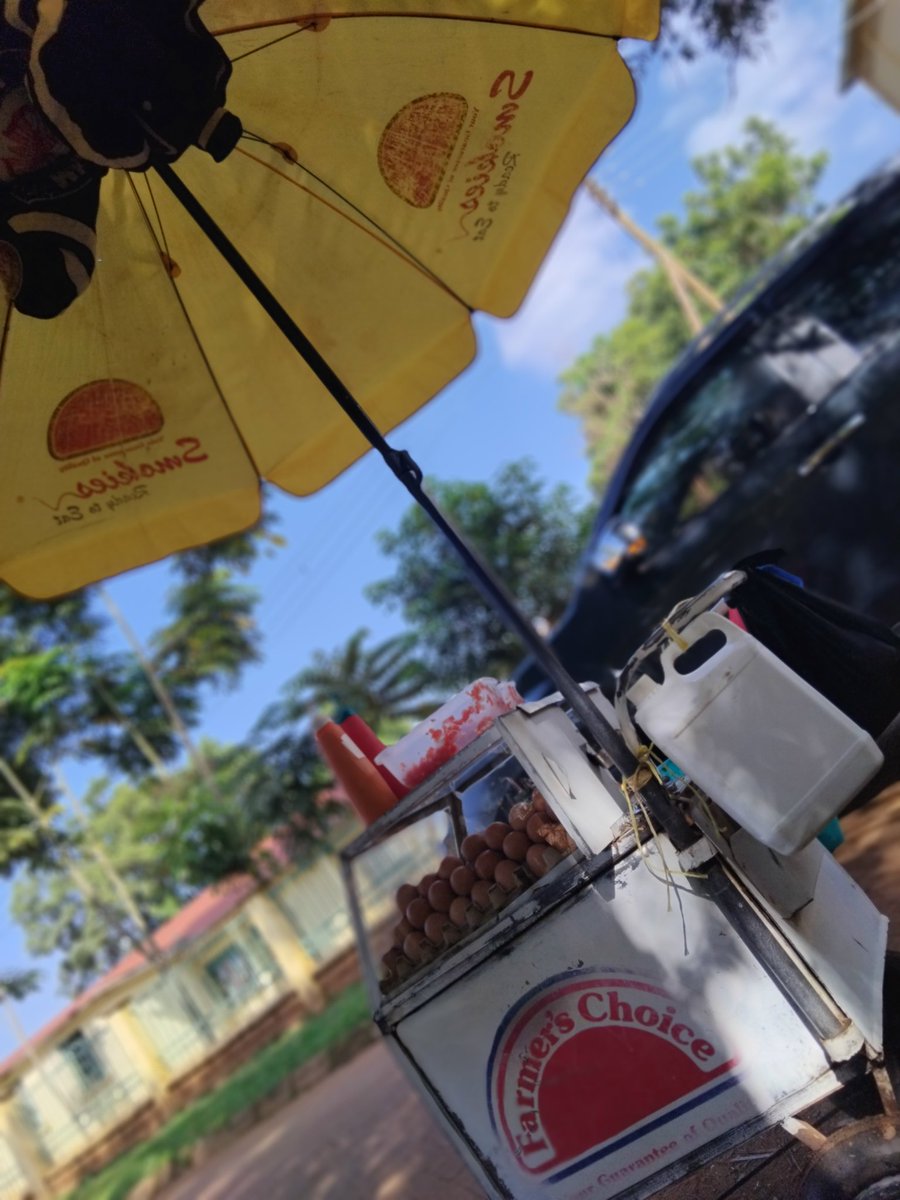 I sell hot boiled eggs and smokies in front of the County Commissioner's Office gate in Busia🧡. Your repost matters a lot. Thanks🤎