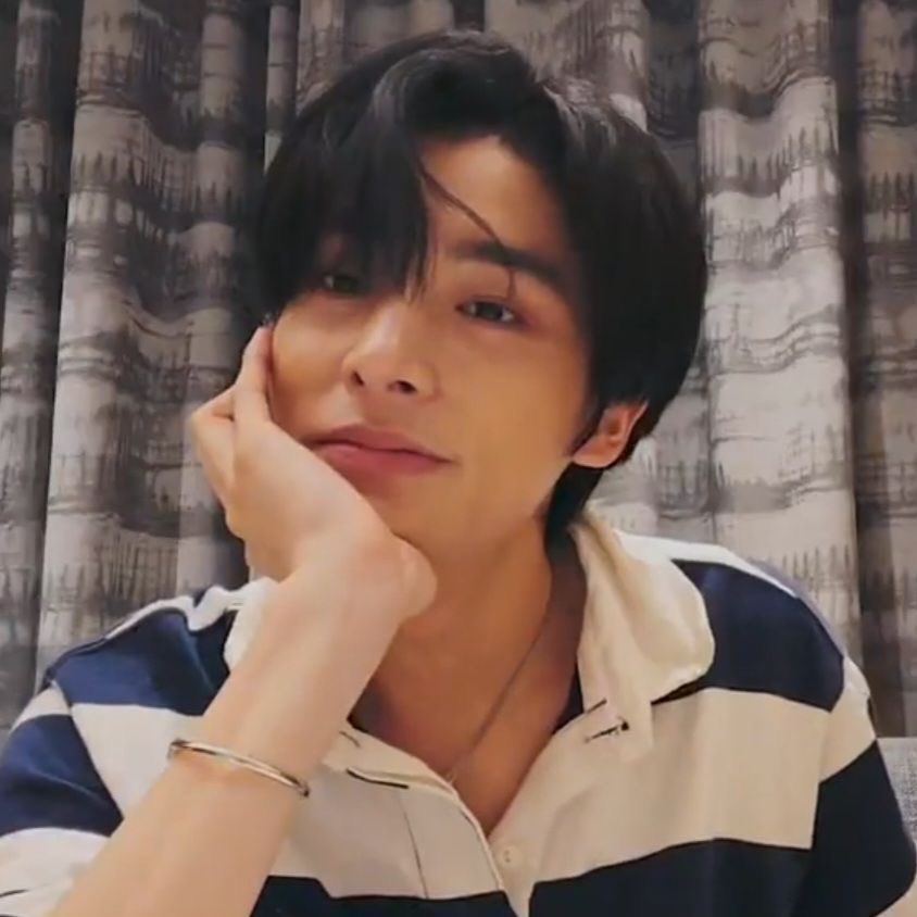 when he rests his hand on his cheek and just stares at you