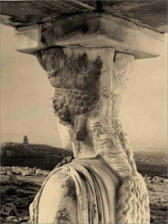 A fantastic close-up photograph of one of the Caryatids from behind as she overlooks Athens like a timeless sentinel at  Erectheum, Acropolis. Photograph taken ca. 1928-1930 by Walter Hege.