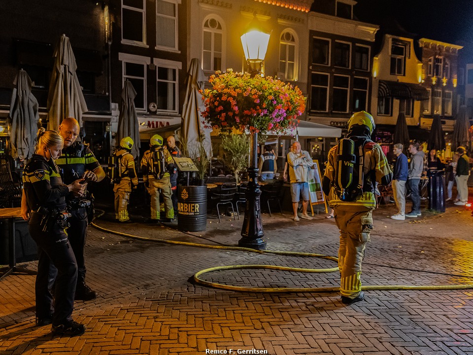 Brand in prullenbak in café Barbier