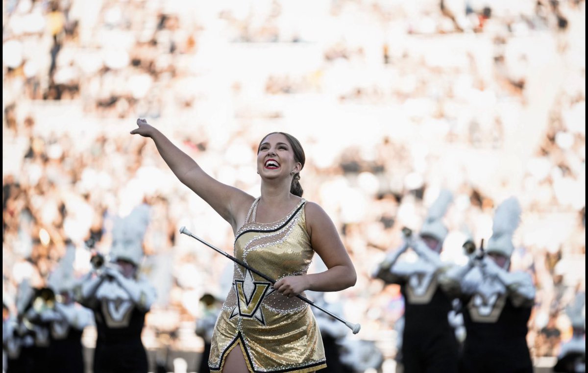 sbgiac's tweet photo. Vanderbilt Feature twirler Sophia Giacalone savoring the sights and sounds of a sold out crowd in the newly renovated #Firstbankstadium @VanderbiltU Saturday evening #college_twirlers #SEC_Twirlers, #collegemarchingbands, #itjustmeansmore #SEC #vandyfan https://t.co/KqqqANOHU1