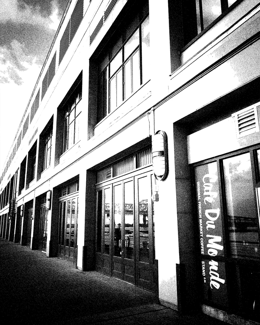 MaxxHendriks's tweet photo. The facade stretches upward, its windows holding fragments of light and memory. A place of stories and passing footsteps, where the air carries whispers of coffee, music, and time worn echoes. The geometry of shadow and sun gives it permanence, yet myste… https://t.co/I9yRQYEpXg https://t.co/GYVwVcCqQ0