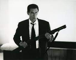 MuseZack's tweet image. An underrated thing from 1990s thrillers--getting a great Native actor and casting him as an incidentally Native big city cop. Must have been fun for Greene &amp;amp; Studi to show up at wardrobe and not be faced with buckskin or denim.