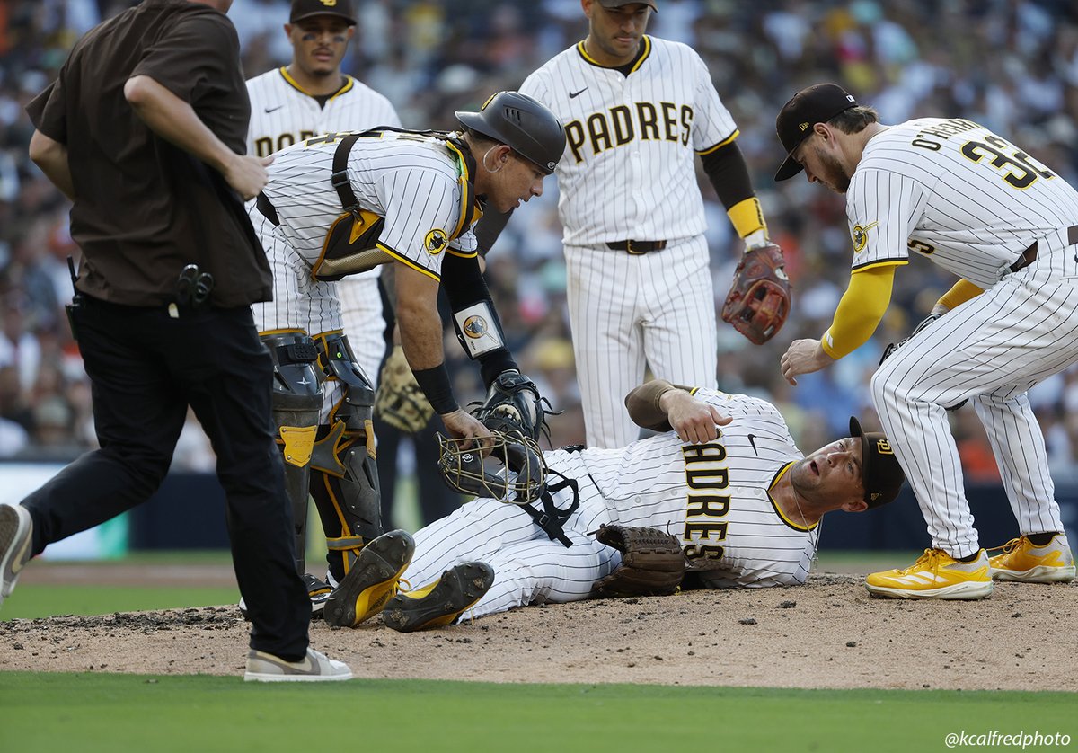 Padres all-star pitcher Jason Adam goes down after injuring his left knee against Baltimore. He appeared to say, "I felt something pop."