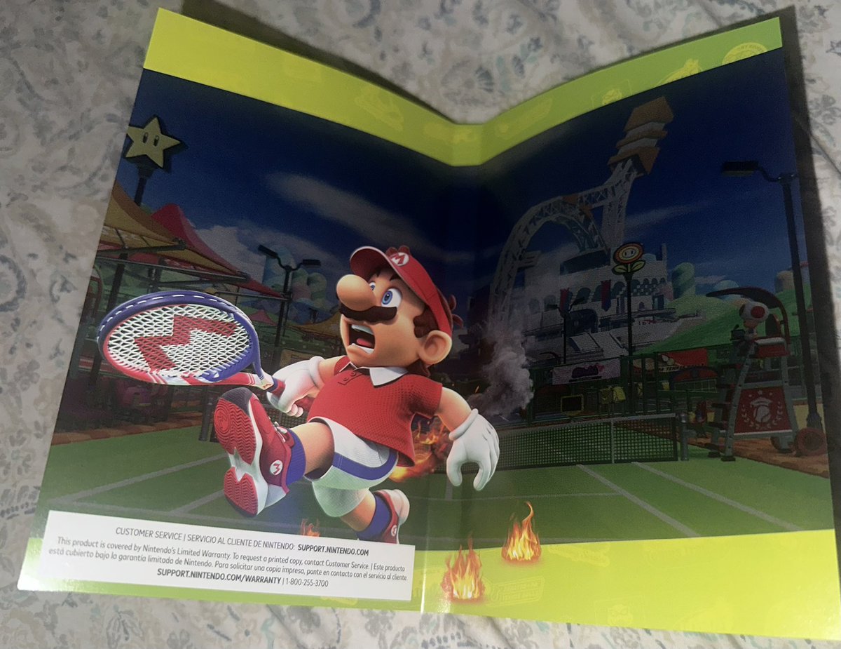 Why did they make the inside art for Tennis Fever be Mario’s ass on fire