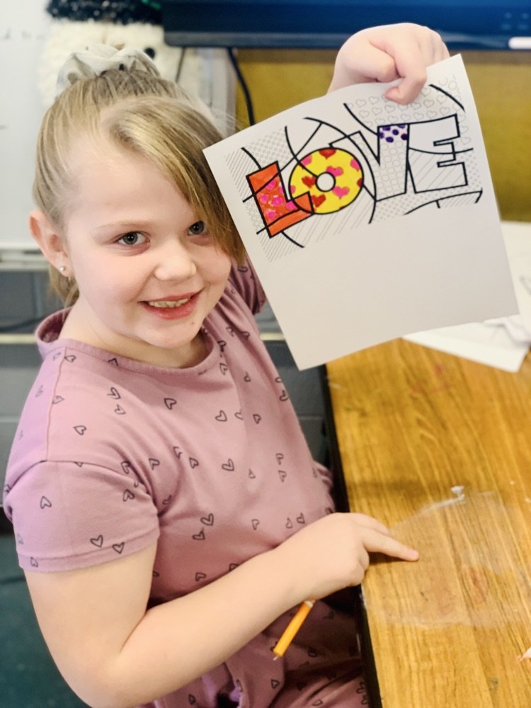 Red and pink are the colors of choice this week in Art.  The students smiles are contagious.