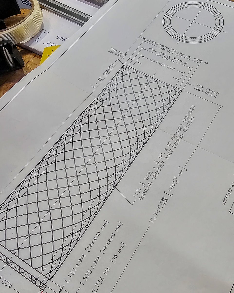 The next step for these dual-durometer expanding mandrel sleeves is to get a "Diamond Groove" cut into them for traction. The roller has a tough, cut-resistant outer layer &amp; an elastic easy-to-stretch inner layer, offering a long service life even in the most demanding condition
