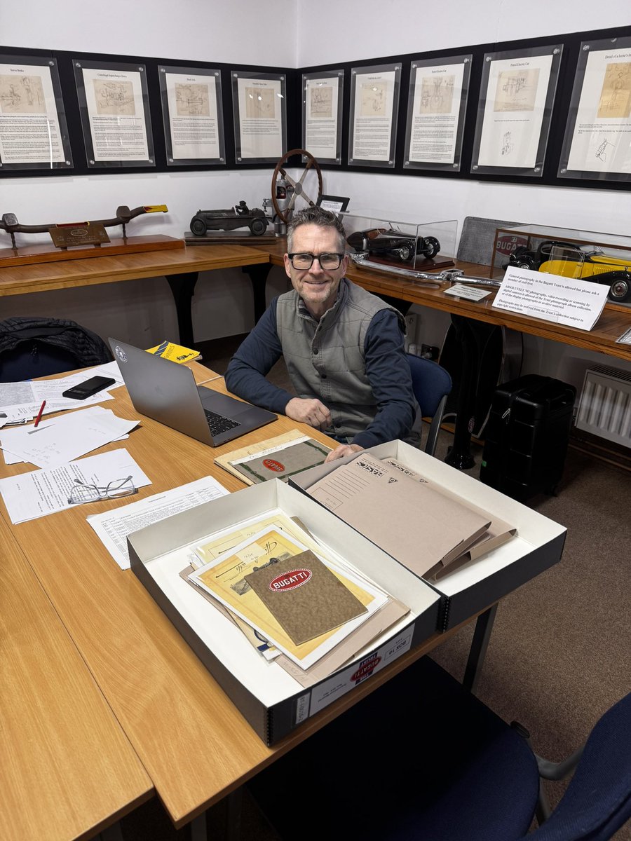 BugattiTrust's tweet photo. We are delighted to welcome author and academic Bruce Berglund to The Bugatti Trust this week. A specialist in the history of world sport, Bruce is carrying out
research in our archives for his forthcoming new biography of Elizabeth Junek — the first English-language biography of this extraordinary racing driver, often referred to as ‘the queen of the steering wheel.’ 
Due for publication in 2027, the book will feature previously unknown photographs and new original source material. Bruce lives and teaches in Prague where he is able to work with the Junek family.
📸 Author Bruce Berglund studying one of our archive boxes during his visit to The Bugatti Trust.
 
#BugattiTrust #ElizabethJunek #bugatti #motoringarchive @professor_in_prague @bugatti @BugattiTrust