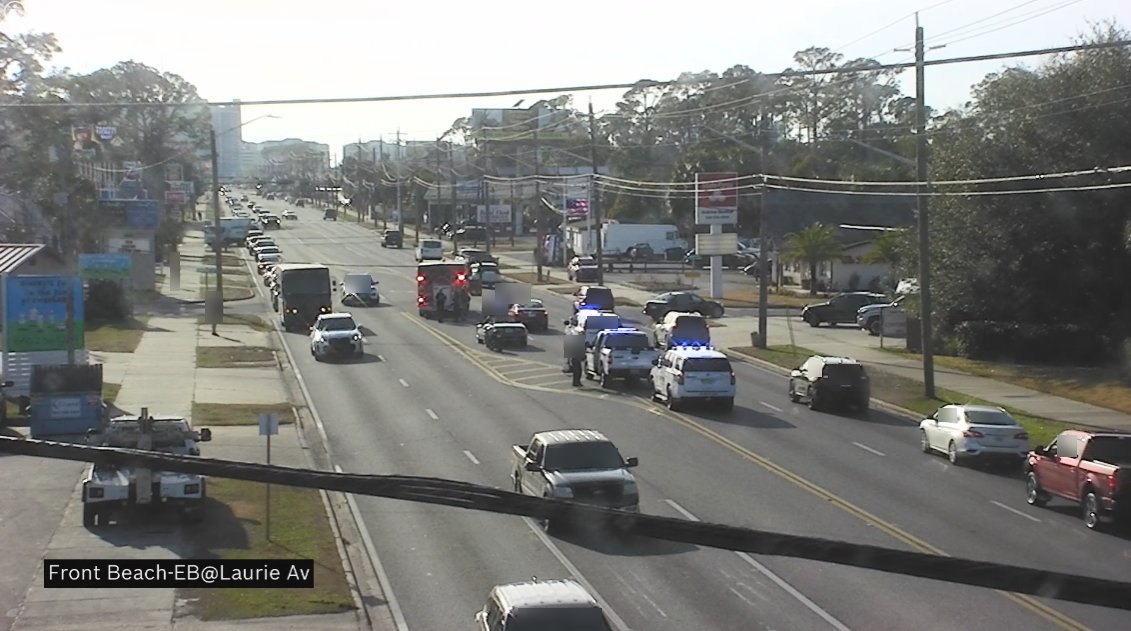 VEHICLE CRASH: West bound Front Beach Rd, West of Laurie Ave. West bound inside lane and West bound left turn lane blocked. Emergency personnel on scene. Use caution.
